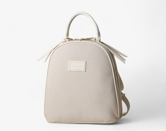 Convertible Double-Compartment Backpack – Versatile and Elegant Everyday Bag