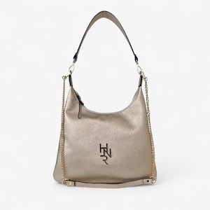 Gold Shoulder Bag With Embossed Texture And Dual Strap