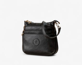 Women’s crossbody multi-compartment bag with adjustable strap