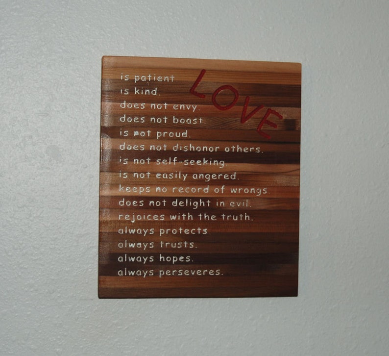 Thoughtful plaque about what love is and love does. LOVE is... Hand painted wood plaque 13064 image 1