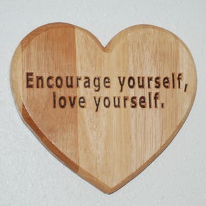 Encourage yourself, love yourself. - Heart shaped, hand painted carved wooden plaque.   24196