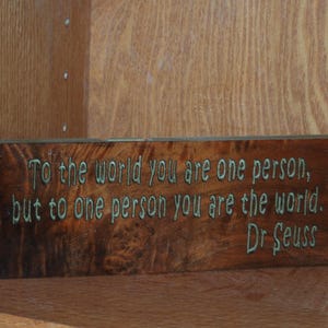To the world you are one person, but to one person you are the world. Dr Seuss -  carved wood plaque - 23189