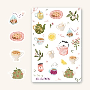 May include: A sheet of stickers featuring illustrations of teapots, teacups, tea bags, cookies, lemons, and other tea-themed items. The stickers are white with pink and green accents. The text "Tea Time by allie illustrated" is at the bottom of the sheet.