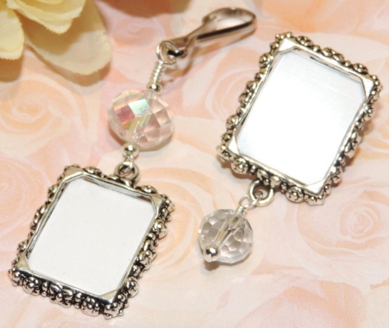 A lapel pin and a wedding bouquet charm set for the bride and groom. Both have a small picture frame in antique silver tones and a clear ab crystal. You can add the photos yourself or chose for me to do them. Other beads & colors available- just ask.