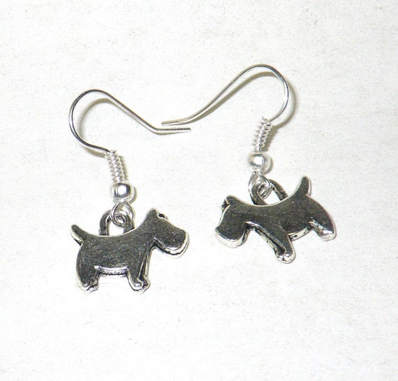 Items similar to Little dog earrings. Silver tone dog jewelry