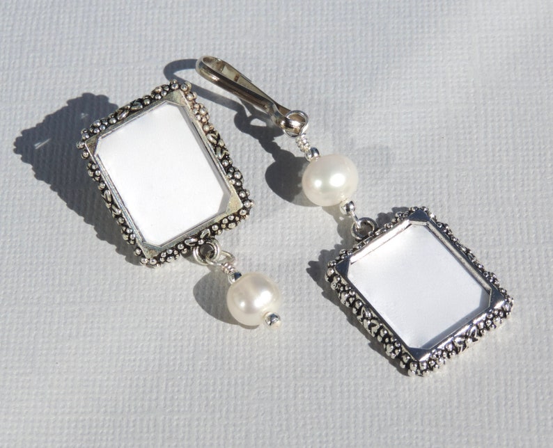 A lapel pin and a wedding bouquet charm set for the bride and groom. Both have a small picture frame in antique silver tones and a freshwater pearl. You can add the photos yourself or chose for me to do them. Other beads & colors available- just ask.