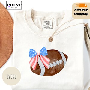 Comfort Colors® Cute Football Mom Shirt, American flag shirt women, Coquette Bows School Spirit Tshirt, Cheer Mascot Tee, Football Team