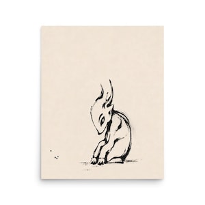 May include: A black ink drawing on a light beige background depicting a small, stylized creature with pointed ears and a hunched posture sitting on the ground. The creature has large, almond-shaped eyes and a simple, minimalist outline.