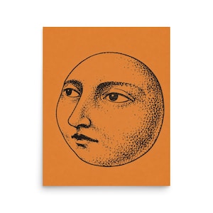 May include: A rectangular print featuring a solid orange background with a centered black ink illustration of a circular moon face. The moon has a stippled texture, defined facial features including eyes, a nose, and a mouth, all rendered in a detailed dot-work style.