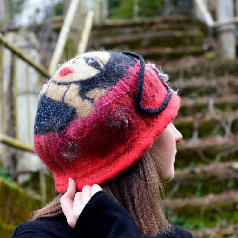 with a felt portrait of a girl for a unique gift. 1920s Cloche in red merino wool