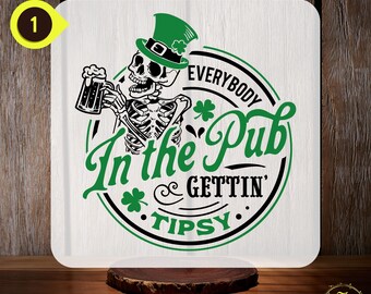 May include: A white, round, iron-on transfer design featuring a skeleton wearing a green hat and holding a beer mug. The design says "Everybody In the Pub & Gettin' Tipsy."