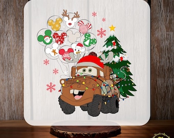 May include: A white square with a Christmas-themed design featuring a cartoon tow truck wearing a Santa hat and holding balloons with Mickey Mouse designs. The text "CUSTOM DTF" and "READY TO PRESS" are displayed.