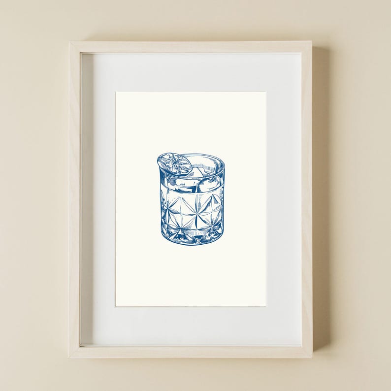May include: A blue line drawing of a cocktail in a cut glass tumbler with a lime wedge garnish.