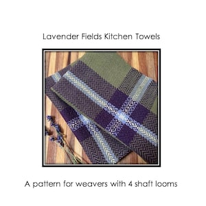 May include: Kitchen towels with a woven pattern in shades of green, purple, and blue. The towels are folded and displayed on a wooden surface. Text on the image reads "Lavender Fields Kitchen Towels" and "A pattern for weavers with 4 shaft looms."