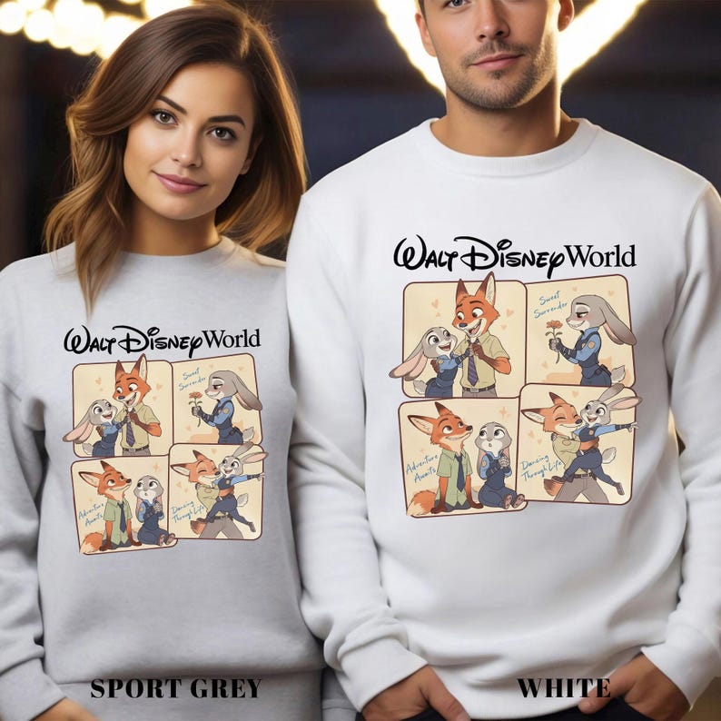 May include: Grey and white sweatshirts with a cartoon illustration of Nick Wilde and Judy Hopps from Zootopia. The sweatshirts have the text "Walt Disney World" above the cartoon. The bottom of the sweatshirts have the text "Sport Grey" and "White".