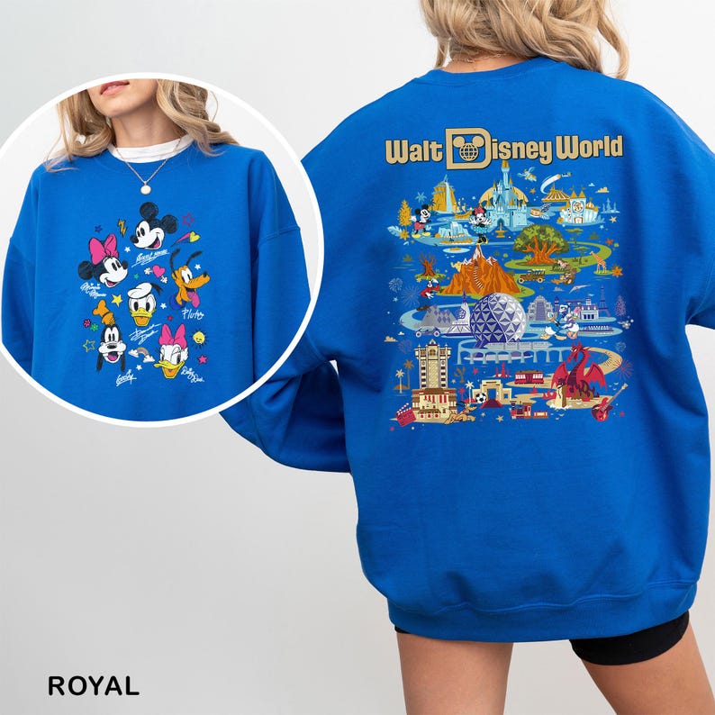 May include: Royal blue sweatshirt featuring Disney characters on the front and a Walt Disney World graphic on the back. The front displays Mickey Mouse, Minnie Mouse, Donald Duck, Daisy Duck, Goofy, and Pluto. The back showcases various park attractions.