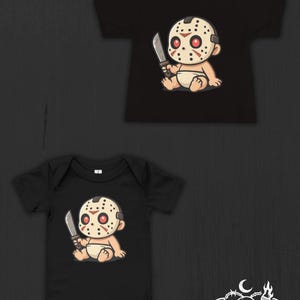 May include: A black short-sleeve t-shirt and a black short-sleeve bodysuit, each featuring a graphic of a cartoon baby wearing a hockey mask and holding a machete. The bottom right corner displays a logo with a skull and the text Nocturnal Nursery Co.