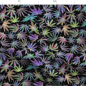 May include: A black background with a repeating pattern of iridescent green, blue, and purple marijuana leaves.