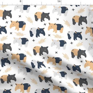 May include: A seamless pattern featuring a white background with a repeating design of tan and gray tapirs with black eyes and noses. The tapirs are facing different directions and are surrounded by small gold stars and stylized gold leaves.