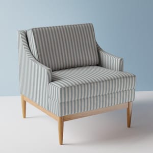 May include: A striped armchair with a light blue and white pattern. The chair has a wooden frame and legs.