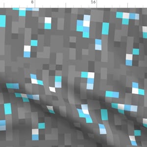 May include: A digital pattern with a gray background and a repeating pattern of blue and white squares.