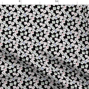 May include: A black background with a repeating pattern of white, green, red, and blue mahjong tiles.