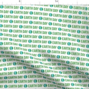 May include: A white background with a repeating pattern of green "Earth Day" text and a blue and green earth icon.