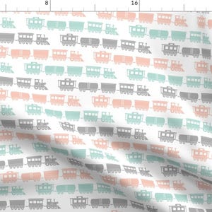 May include: A seamless pattern featuring repeating images of toy trains in shades of gray, teal, and pink. The trains are arranged in rows and are all facing the same direction.