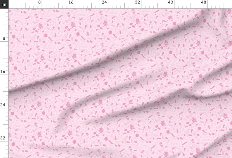 May include: A pink fabric with a repeating pattern of pink abstract shapes. The fabric has a subtle texture.