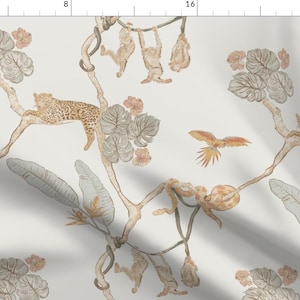 May include: A watercolour illustration of a jungle scene featuring leopards, monkeys, and birds on a cream background. The design includes botanical elements, such as leaves and flowers, in muted tones of brown, grey, and peach.