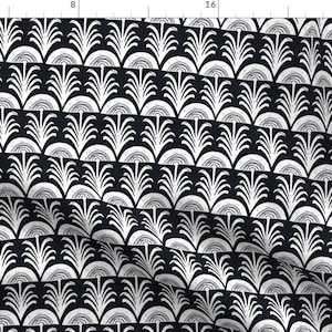 May include: Black and white geometric pattern with a repeating design of stylized palm trees. The pattern is reminiscent of Art Deco style.