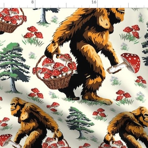 May include: A seamless pattern featuring a brown Bigfoot carrying a basket of red and white mushrooms. The background is a cream colour with green trees and more mushrooms.