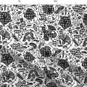 May include: Black and white floral pattern fabric with a repeating design of stylized flowers and leaves.