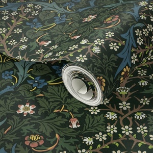 May include: A roll of dark green wallpaper with a floral pattern featuring white, blue, and red flowers. The wallpaper has a vintage aesthetic and is perfect for adding a touch of elegance to any room.