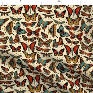 May include: A seamless pattern featuring a variety of colourful butterflies with intricate details. The butterflies are arranged in a repeating pattern on a cream background.