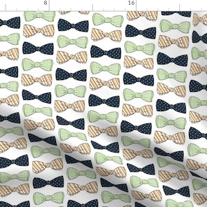 May include: A white background with a repeating pattern of bow ties in various colors and patterns. The bow ties are in shades of green, brown, blue, and white. The bow ties are arranged in rows and columns.