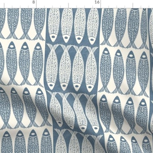 May include: A fabric pattern featuring a repeating motif of stylized fish arranged in vertical columns. The design alternates between dark blue fish on a cream background and cream-colored fish on a dark blue background, creating a high-contrast look.