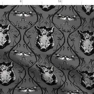 May include: A black and white repeating pattern featuring a stylised boar head and a moth with wings spread. The pattern is set against a dark grey background.