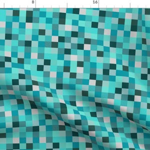 May include: A seamless pattern of teal, blue, and gray squares. The squares are arranged in a diagonal pattern, creating a pixelated effect.