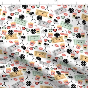 May include: A white background with a repeating pattern of movie-themed icons. The icons include popcorn buckets, cinema tickets, 3D glasses, film reels, and lips. The icons are in various colours, including red, yellow, green, and black.