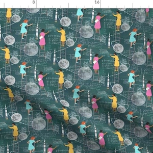 May include: A teal blue fabric with a repeating pattern of women in different colored dresses writing on a chalkboard. The chalkboard is filled with white chalk drawings of rockets, moons, and mathematical equations.