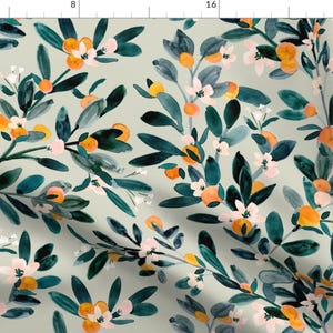 May include: A seamless pattern featuring a repeating design of stylised orange trees with green leaves, orange fruit, and white flowers on a light grey background.