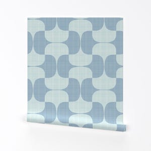 May include: A blue and white geometric pattern wallpaper with a subtle linen texture. The pattern features repeating rounded shapes.