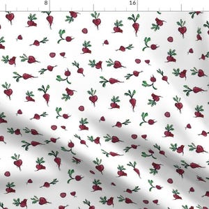 May include: A white background with a repeating pattern of red beetroot with green leaves. The beetroot are drawn in a watercolour style.