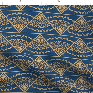 May include: A seamless pattern featuring a repeating geometric design of gold stylized flower motifs on a deep blue background.