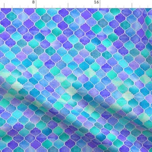 May include: A seamless pattern of blue, purple, and green watercolor Moroccan tiles. The tiles are arranged in a repeating pattern and have a white outline.