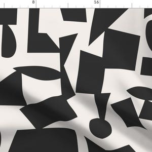 Peut inclure: Motif géométrique abstrait en noir et blanc. Le motif présente une variété de formes et de tailles, créant un look moderne et élégant.