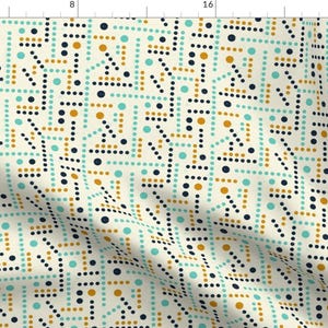 May include: A seamless pattern featuring a geometric design with black, gold, and turquoise dots on a cream background.