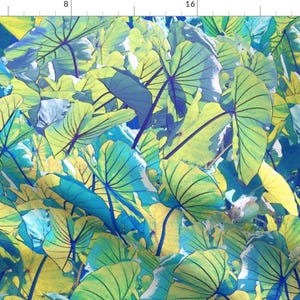 May include: A vibrant abstract pattern featuring large, overlapping leaves in shades of blue, green, and yellow. The leaves have a watercolor-like effect, creating a sense of depth and movement.