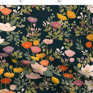 May include: A dark teal fabric with a floral pattern featuring pink, orange, yellow, and purple flowers. The flowers are surrounded by green leaves and stems.